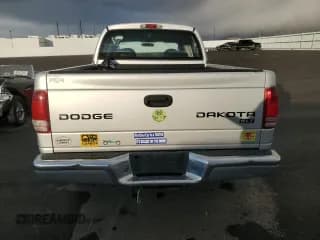 ✅ 2003 Dodge Dakota SLT • VIN: 1D7HG48N63S294766 • Lot: 81165574. Wystawiony na Copart z przebiegiem 159 132 mil. Bezpłatny archiwum sprzedaży aukcyjnych z USA i szczegółowy raport historii pojazdu na DreamBid. Zdjęcie 6.