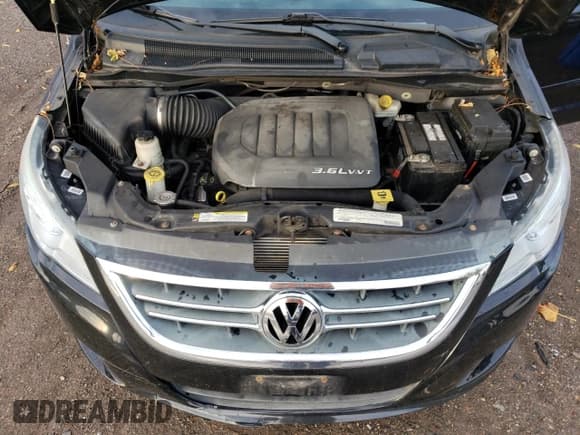 ✅ 2012 Volkswagen Routan SE • VIN: 2C4RVABG5CR292697 • Lot: 87095645. Listed on Copart with 191,922 mi. Free auction sales archive from the USA and detailed vehicle history report at DreamBid. Image 12.