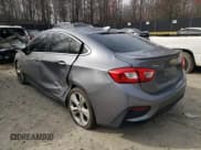 ✅ 2018 Chevrolet Cruze Premier • VIN: 1G1BF5SM5J7156010 • Lot: 46577323. Listed on Copart with 107,132 mi. Free auction sales archive from the USA and detailed vehicle history report at DreamBid. Image 2.