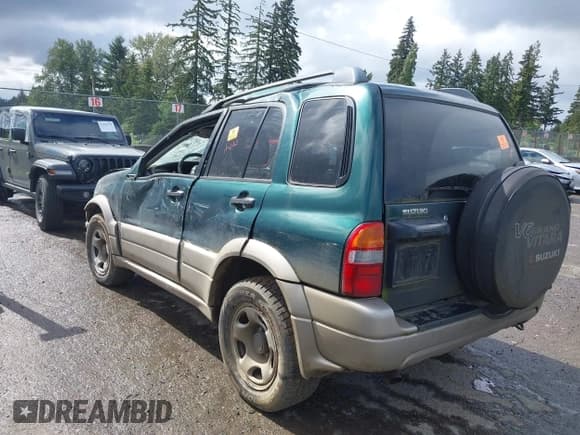 ✅ 2002 Suzuki Grand Vitara JLX • VIN: JS3TD62V824153848 • Lot: 42254276. Listed on IAAI with 181,007 mi. Free auction sales archive from the USA and detailed vehicle history report at DreamBid. Image 3.