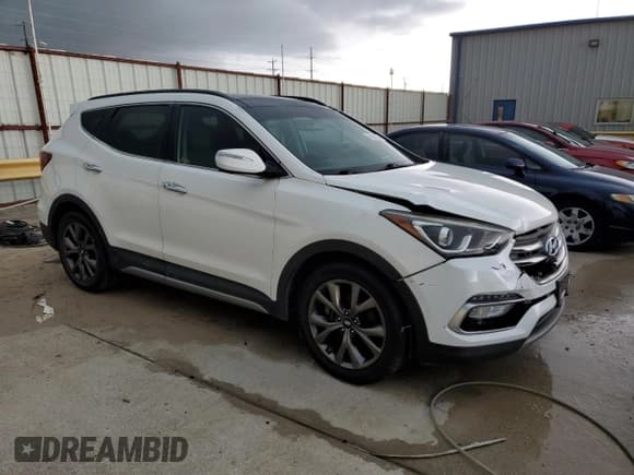 ✅ 2018 Hyundai Santa Fe Ultimate • VIN: 5NMZW4LA7JH092842 • Лот: 56568514. Опубликован ранее на Copart с пробегом 105 888 миль. Бесплатный доступ к архиву аукционных продаж из США и подробный отчёт об истории автомобиля на DreamBid. Изображение 4.