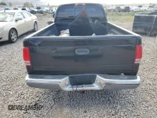 ✅ 1999 Dodge Dakota SLT • VIN: 1B7GL22X5XS298216 • Lot: 63887324. Wystawiony na Copart z przebiegiem Nie podano. Bezpłatny archiwum sprzedaży aukcyjnych z USA i szczegółowy raport historii pojazdu na DreamBid. Zdjęcie 6.