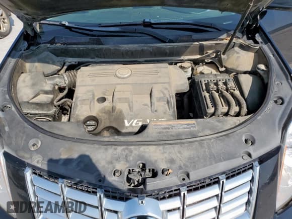 ✅ 2013 Cadillac SRX • VIN: 3GYFNAE39DS615000 • Лот: 71664145. Опубликован ранее на Copart с пробегом 300 732 миль. Бесплатный доступ к архиву аукционных продаж из США и подробный отчёт об истории автомобиля на DreamBid. Изображение 12.