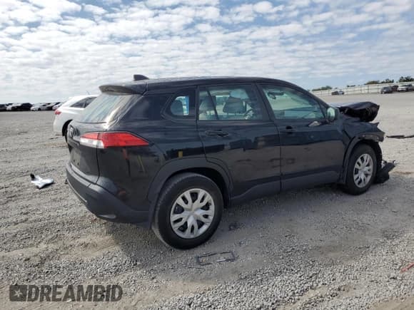 ✅ 2023 Toyota Corolla Cross L • VIN: 7MUAAAAG3PV050682 • Lot: 80054275. Listed on Copart with 51,704 mi. Free auction sales archive from the USA and detailed vehicle history report at DreamBid. Image 3.