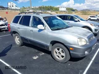 2004 Hyundai Santa Fe GLS z VIN KM8SC13E44U759791, wystawiony jako IAAI lot #43234198 z przebiegiem 355 506 mil mil oraz . Historia ofert i sprzedaży dostępna na DreamBid. Obrazek 1.