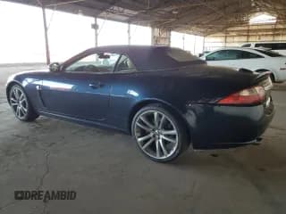 ✅ 2009 Jaguar XK • VIN: SAJWA44B595B28541 • Лот: 80187204. Опубликован ранее на Copart с пробегом 71 722 миль. Бесплатный доступ к архиву аукционных продаж из США и подробный отчёт об истории автомобиля на DreamBid. Изображение 2.