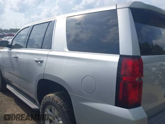 2016 Chevrolet Tahoe Commercial with VIN 1GNSKFEC8GR272043, listed as a IAAI auction lot 42127240 with 209,570 mi miles and . Bid and sale history available at DreamBid. Image 14.