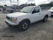 ✅ 1998 Nissan Frontier XE • VIN: 1N6DD21SXWC387985 • Lot: 84769815. Listed on Copart with 184,959 mi. Free auction sales archive from the USA and detailed vehicle history report at DreamBid. Image 1.