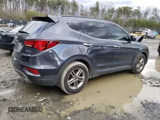 ✅ 2017 Hyundai Santa Fe 2.4L • VIN: 5XYZU3LB0HG490942 • Лот: 45930924. Опубликован ранее на Copart с пробегом 87 356 миль. Бесплатный доступ к архиву аукционных продаж из США и подробный отчёт об истории автомобиля на DreamBid. Изображение 3.