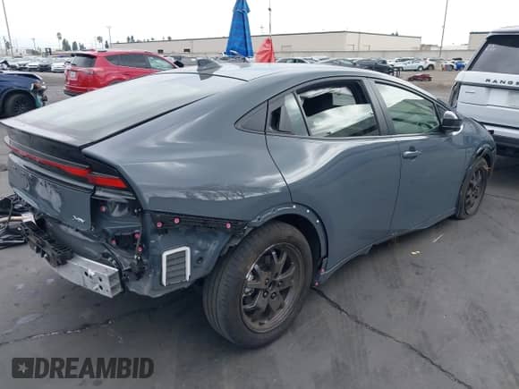 2024 Toyota Prius LE with VIN JTDACAAU6R3046057, listed as a IAAI auction lot 43316816 with 14,220 mi miles and . Bid and sale history available at DreamBid. Image 4.