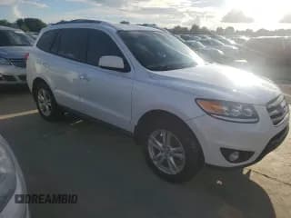 ✅ 2012 Hyundai Santa Fe Limited • VIN: 5XYZK4AG0CG104670 • Lot: 74339274. Listed on Copart with 69,102 mi. Free auction sales archive from the USA and detailed vehicle history report at DreamBid. Image 4.