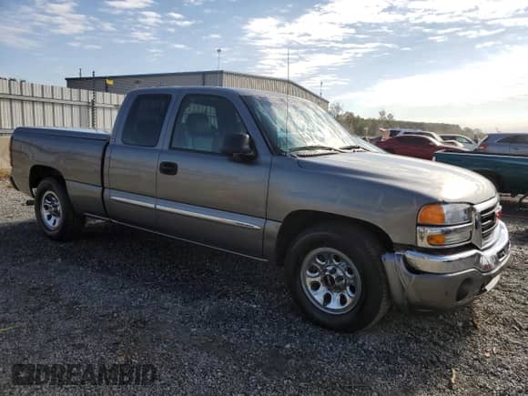 2006 GMC Sierra 1500 SLE1 with VIN 1GTEC19V66Z143900, listed as a Copart auction lot 76006534 with 255,088 mi miles and Salvage title. Bid and sale history available at DreamBid. Image 4.