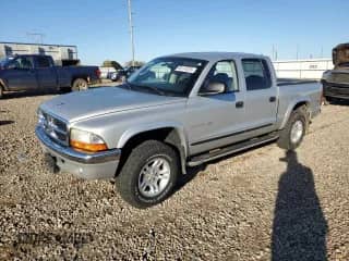 2002 Dodge Dakota SLT z VIN 1B7HG48N02S564941, wystawiony jako Copart lot #85174375 z przebiegiem 110 566 mil mil oraz Czysty tytuł • Clean title. Historia ofert i sprzedaży dostępna na DreamBid. Obrazek 1.