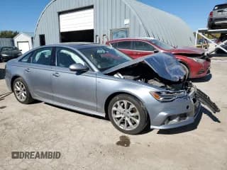 ✅ 2018 Audi A6 Premium Plus • VIN: WAUD8AFC5JN036091 • Лот: 90885665. Опубликован ранее на Copart с пробегом 128 167 миль. Бесплатный доступ к архиву аукционных продаж из США и подробный отчёт об истории автомобиля на DreamBid. Изображение 4.