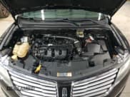 ✅ 2015 Lincoln MKC • VIN: 5LMTJ2AHXFUJ35720 • Лот: 92878795. Опубликован ранее на Copart с пробегом 172 971 миль. Бесплатный доступ к архиву аукционных продаж из США и подробный отчёт об истории автомобиля на DreamBid. Изображение 12.