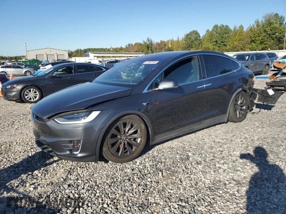 ✅ 2017 Tesla Model X 90D • VIN: 5YJXCBE2XHF056830 • Лот: 91083135. Опубликован ранее на Copart с пробегом 145 390 миль. Бесплатный доступ к архиву аукционных продаж из США и подробный отчёт об истории автомобиля на DreamBid. Изображение 1.