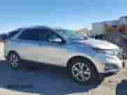 2018 Chevrolet Equinox Premier z VIN 3GNAXMEV1JS594725, wystawiony jako Copart lot #86439035 z przebiegiem 118 176 mil mil oraz Szkoda całkowita • Salvage title. Historia ofert i sprzedaży dostępna na DreamBid. Obrazek 4.