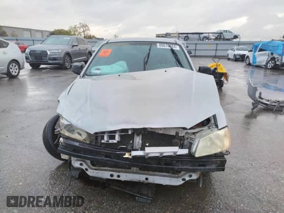 2002 Hyundai Accent GL with VIN KMHCG45C02U301443, listed as a Copart auction lot 80670164 with 124,163 mi miles and Salvage title. Bid and sale history available at DreamBid. Image 5.