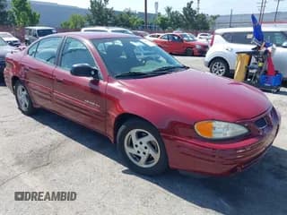 ✅ 1999 Pontiac Grand Am SE2 • VIN: 1G2NE52T0XM702788 • Lot: 42564414. Listed on IAAI with 195,067 mi. Free auction sales archive from the USA and detailed vehicle history report at DreamBid. Image 1.