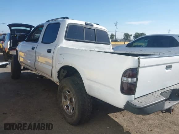 ✅ 2002 Toyota Tacoma PreRunner • VIN: 5TEGN92N12Z898950 • Lot: 43078464. Listed on IAAI with 265,021 mi. Free auction sales archive from the USA and detailed vehicle history report at DreamBid. Image 3.