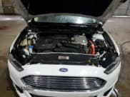 ✅ 2013 Ford Fusion SE Hybrid • VIN: 3FA6P0LU7DR360009 • Lot: 92398755. Listed on Copart with 127,902 mi. Free auction sales archive from the USA and detailed vehicle history report at DreamBid. Image 11.