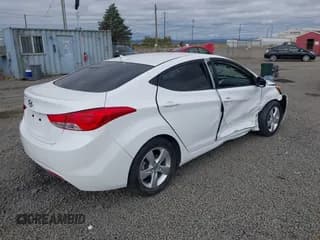 ✅ 2013 Hyundai Elantra GLS • VIN: 5NPDH4AE8DH255600 • Lot: 42917259. Listed on IAAI with 71,002 mi. Free auction sales archive from the USA and detailed vehicle history report at DreamBid. Image 4.