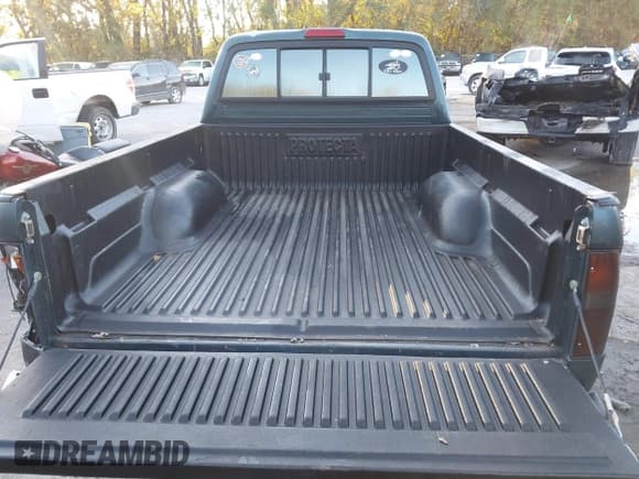 ✅ 1998 Toyota Tacoma • VIN: 4TAVL52N6WZ079631 • Лот: 43590530. Опубликован ранее на IAAI с пробегом 249 755 миль. Бесплатный доступ к архиву аукционных продаж из США и подробный отчёт об истории автомобиля на DreamBid. Изображение 17.