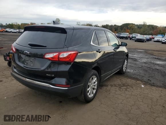 ✅ 2020 Chevrolet Equinox LT • VIN: 2GNAXUEV7L6143011 • Lot: 86133505. Listed on Copart with 136,880 mi. Free auction sales archive from the USA and detailed vehicle history report at DreamBid. Image 3.
