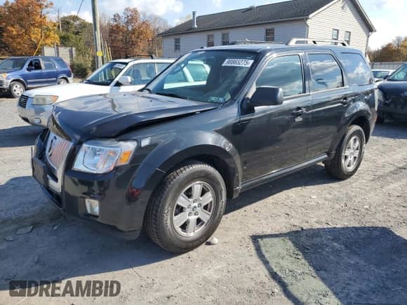 2011 Mercury Mariner с VIN 4M2CN8B78BKJ03563, выставлен на аукционе Copart как лот 90865275 с пробегом 84 082 миль миль и Списание • Salvage title. История ставок и продаж доступна на DreamBid. Изображение 1.