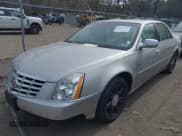 ✅ 2007 Cadillac DTS Luxury I • VIN: 1G6KD57Y67U162226 • Lot: 42087087. Listed on IAAI with 92,370 mi. Free auction sales archive from the USA and detailed vehicle history report at DreamBid. Image 2.