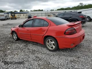 ✅ 2003 Pontiac Grand Am GT • VIN: 1G2NW52E43C273072 • Лот: 64019124. Опубликован ранее на Copart с пробегом 327 266 миль. Бесплатный доступ к архиву аукционных продаж из США и подробный отчёт об истории автомобиля на DreamBid. Изображение 2.