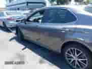 2022 Toyota Camry Hybrid XLE with VIN 4T1F31AK4NU571560, listed as a IAAI auction lot 42654973 with 10,810 mi miles and . Bid and sale history available at DreamBid. Image 14.