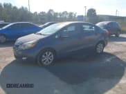 ✅ 2013 Kia Rio EX • VIN: KNADN4A35D6100100 • Lot: 43876339. Listed on IAAI with 130,768 mi. Free auction sales archive from the USA and detailed vehicle history report at DreamBid. Image 2.