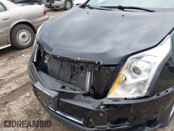 ✅ 2013 Cadillac SRX • VIN: 3GYFNAE35DS630254 • Лот: 42377205. Опубликован ранее на IAAI с пробегом 100 568 миль. Бесплатный доступ к архиву аукционных продаж из США и подробный отчёт об истории автомобиля на DreamBid. Изображение 10.