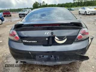 2007 Hyundai Tiburon GS с VIN KMHHM66DX7U250719, выставлен на аукционе Copart как лот 64951335 с пробегом 208 422 миль миль и Списание • Salvage title. История ставок и продаж доступна на DreamBid. Изображение 6.