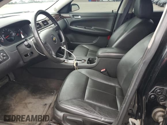 ✅ 2014 Chevrolet Impala LTZ • VIN: 2G1WC5E35E1107633 • Lot: 61047115. Listed on Copart with 95,200 mi. Free auction sales archive from the USA and detailed vehicle history report at DreamBid. Image 7.