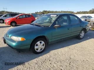 ✅ 1997 Ford Contour • VIN: 3FALP6536VM113346 • Лот: 70036024. Опубликован ранее на Copart с пробегом 115 084 миль. Бесплатный доступ к архиву аукционных продаж из США и подробный отчёт об истории автомобиля на DreamBid. Изображение 1.
