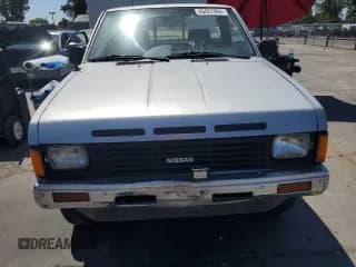 ✅ 1987 Nissan Hardbody E • VIN: JN6ND11S1HW030629 • Lot: 65657004. Wystawiony na Copart z przebiegiem 181 228 mil. Bezpłatny archiwum sprzedaży aukcyjnych z USA i szczegółowy raport historii pojazdu na DreamBid. Zdjęcie 5.