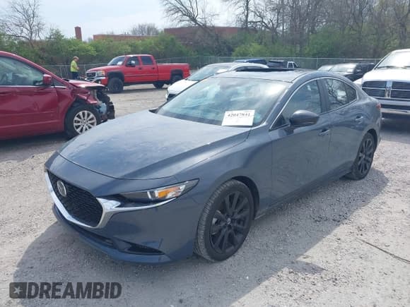 ✅ 2024 Mazda 3 S Carbon Edition • VIN: 3MZBPBCM3RM416565 • Lot: 42047841. Listed on IAAI with 11,074 mi. Free auction sales archive from the USA and detailed vehicle history report at DreamBid. Image 6.