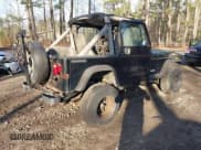 ✅ 1990 Jeep Wrangler S • VIN: 2J4FY19E1LJ505667 • Lot: 42788286. Listed on IAAI with 207,813 mi. Free auction sales archive from the USA and detailed vehicle history report at DreamBid. Image 4.