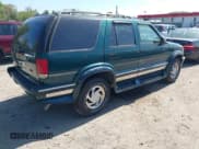 ✅ 1997 Chevrolet Blazer LS • VIN: 1GNDT13WXV2175468 • Lot: 42081531. Wystawiony na IAAI z przebiegiem 148 858 mil. Bezpłatny archiwum sprzedaży aukcyjnych z USA i szczegółowy raport historii pojazdu na DreamBid. Zdjęcie 4.