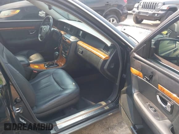 ✅ 2005 Kia Amanti • VIN: KNALD124755064017 • Lot: 42721503. Wystawiony na IAAI z przebiegiem 86 205 mil. Bezpłatny archiwum sprzedaży aukcyjnych z USA i szczegółowy raport historii pojazdu na DreamBid. Zdjęcie 5.