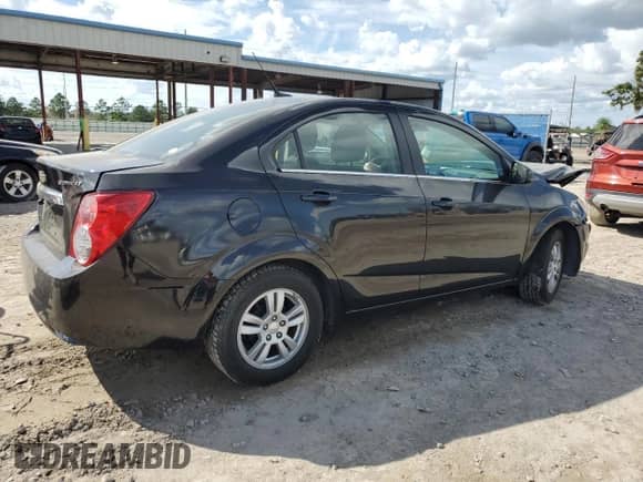 2014 Chevrolet Sonic LT с VIN 1G1JC5SH3E4104793, выставлен на аукционе Copart как лот 73387814 с пробегом 73 644 миль миль и На запчасти • Non repairable. История ставок и продаж доступна на DreamBid. Изображение 3.