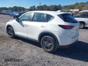 ✅ 2021 Mazda CX-5 Sport • VIN: JM3KFABM3M0330841 • Lot: 43596526. Wystawiony na IAAI z przebiegiem 79 524 mil. Bezpłatny archiwum sprzedaży aukcyjnych z USA i szczegółowy raport historii pojazdu na DreamBid. Zdjęcie 1.