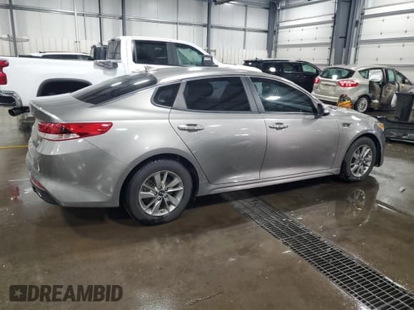 ✅ 2016 Kia Optima LX Turbo • VIN: 5XXGT4L16GG077448 • Lot: 89912835. Wystawiony na Copart z przebiegiem 150 753 mil. Bezpłatny archiwum sprzedaży aukcyjnych z USA i szczegółowy raport historii pojazdu na DreamBid. Zdjęcie 3.