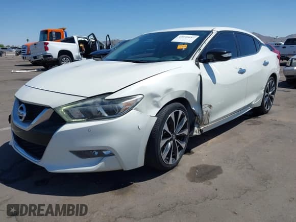✅ 2016 Nissan Maxima Platinum • VIN: 1N4AA6AP2GC414010 • Lot: 42040037. Wystawiony na IAAI z przebiegiem 140 752 mil. Bezpłatny archiwum sprzedaży aukcyjnych z USA i szczegółowy raport historii pojazdu na DreamBid. Zdjęcie 2.