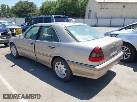 ✅ 2000 Mercedes-Benz C 230/260/280/320 • VIN: WDBHA29G1YA802945 • Лот: 42524661. Опубликован ранее на IAAI с пробегом 161 227 миль. Бесплатный доступ к архиву аукционных продаж из США и подробный отчёт об истории автомобиля на DreamBid. Изображение 3.