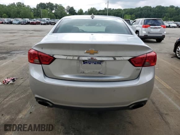 ✅ 2014 Chevrolet Impala LTZ • VIN: 2G1155S32E9121161 • Lot: 65120684. Listed on Copart with 103,637 mi. Free auction sales archive from the USA and detailed vehicle history report at DreamBid. Image 6.