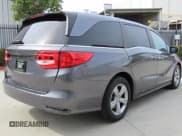 ✅ 2020 Honda Odyssey EX-L • VIN: 5FNRL6H78LB029948 • Лот: 92513395. Опубликован ранее на Copart с пробегом 42 248 миль. Бесплатный доступ к архиву аукционных продаж из США и подробный отчёт об истории автомобиля на DreamBid. Изображение 3.