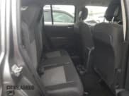 ✅ 2014 Jeep Patriot Latitude • VIN: 1C4NJRFBXED627790 • Lot: 92002875. Wystawiony na Copart z przebiegiem 142 265 mil. Bezpłatny archiwum sprzedaży aukcyjnych z USA i szczegółowy raport historii pojazdu na DreamBid. Zdjęcie 10.